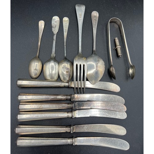 821 - Silver to include four spoons, sugar tongs, fork, pencil and silver handled knives- various dates an... 