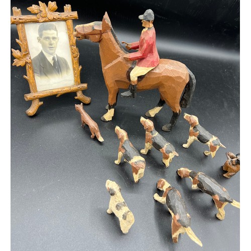 1265 - Vintage carved wooden horse, huntsman, fox and hounds with a carved wooden picture frame. Height of ... 