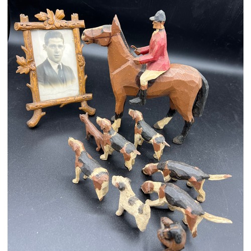 1265 - Vintage carved wooden horse, huntsman, fox and hounds with a carved wooden picture frame. Height of ... 