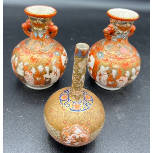 761 - Three Kutani vases and one hard wood stand.. Approx. 10cm h.