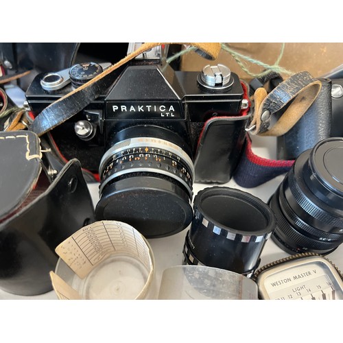 1266 - A collection of cameras, lenses and equipment to include Olympus XA 2, Agfa, Canon AE-1, Canon EOS 5... 