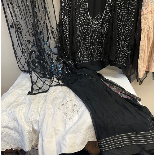 703 - Costume to include 1920's beaded/sequinned dresses, cotton petticoats, beadwork belt and black scarf... 