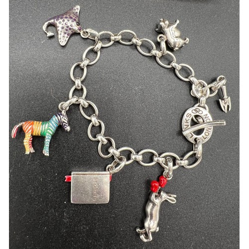 547 - A Links of London silver charm bracelet with 6 various charms. In original presentation box with bag... 