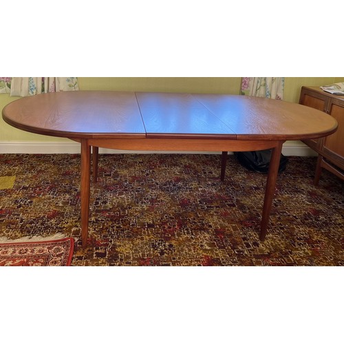 8 - A teak extending dining table. 160 x 111cm closed. 205cm approx extended.