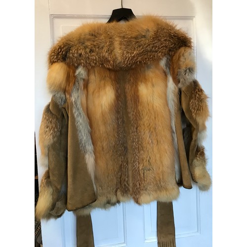 702 - Fox fur and Suede jacket measuring 48cm  wide armpit to armpit. Initials SMF embroidered inside also... 