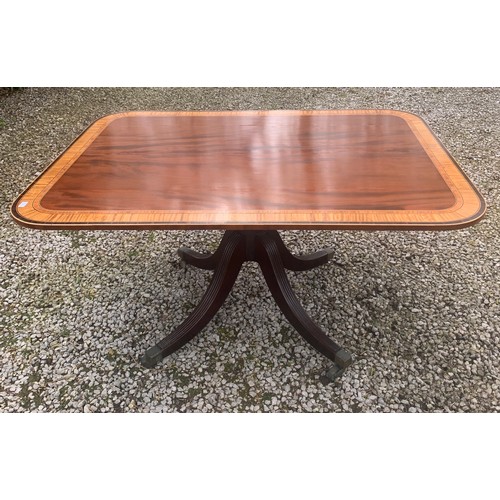9 - A good quality 19thC tip top mahogany table with cross banding to top. 144 x 105cm.