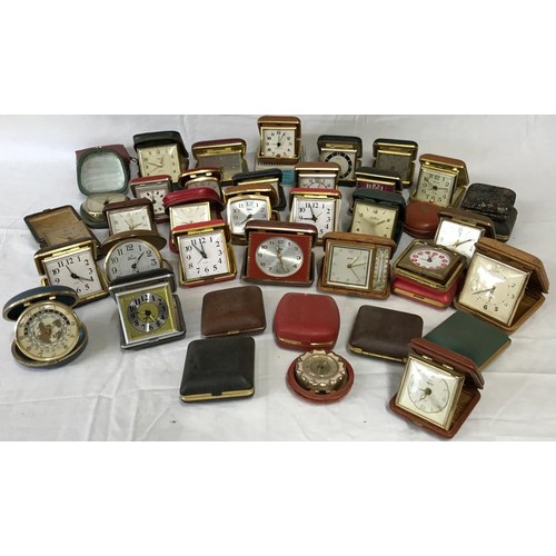 1052 - Collection of 40 travel alarm clocks varying makes, Smiths, Westclox, Equity, Europa, Olympic, Estym... 