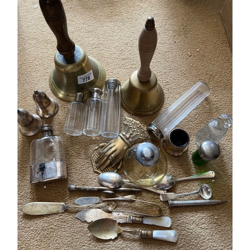 778 - Mixed lot to include 2 brass bells, various plated cutlery, hand brass letter clip, 2 silver plated ... 