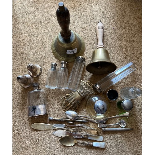 778 - Mixed lot to include 2 brass bells, various plated cutlery, hand brass letter clip, 2 silver plated ... 