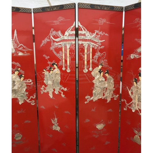 15 - A large coromandel room dividing screen depicting oriental scenes. 183 h, four panels each 46cm w.