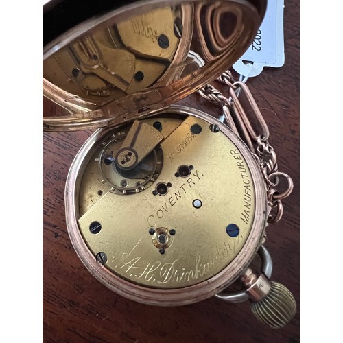 920 - A 9ct gold cased pocket watch and chain with 9ct medal to A. Cameron for Long Service London Midland... 