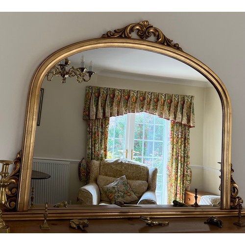 1145 - A gilt overmantel mirror. 129 w x 92cm w.