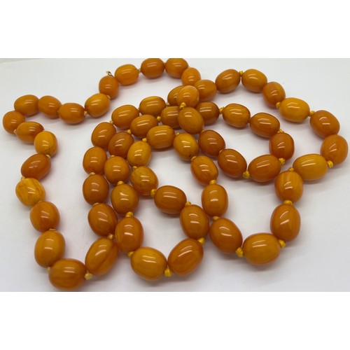 541 - Two string of butterscotch amber beads, approx length 80 & 52cm. 213.9gm.