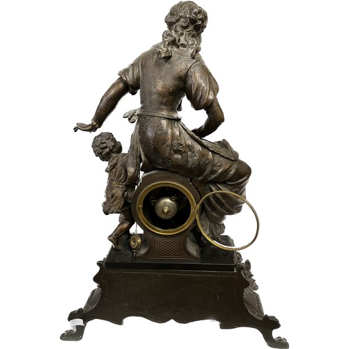 1184 - Large bronze and black marble ornate French mantle clock, depicting a seated classical female figure... 