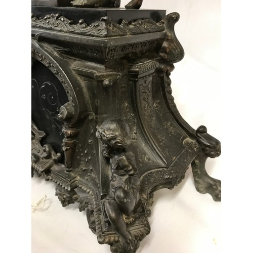 1184 - Large bronze and black marble ornate French mantle clock, depicting a seated classical female figure... 