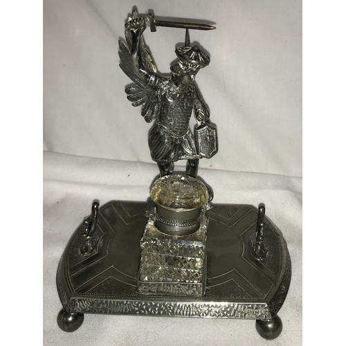 689 - A silver-plated inkstand by James Deakin & Sons (1871-1939), to the centre a cast of St George and t... 