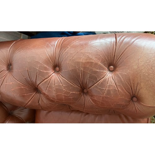 68 - Brown leather upholstered button backed chesterfield sofa. 187 x 87 x 65cm.