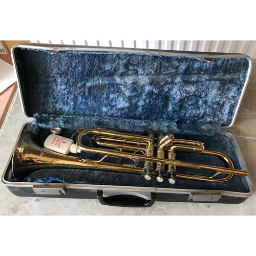 1155 - A boxed Corton trumpet.