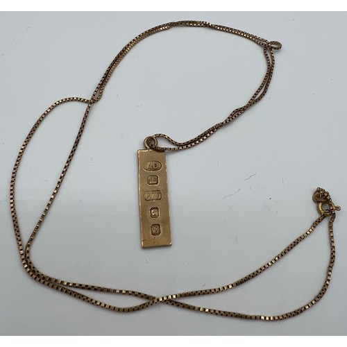 529 - A 9ct gold ingot on 9ct chain. Chain length 74cm, total weight 7.4gm.