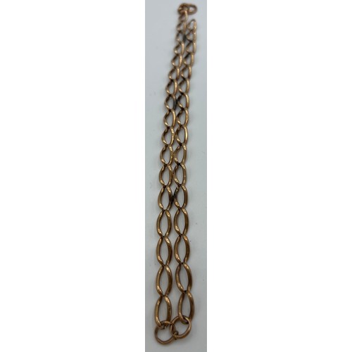 530 - A 9ct gold double chain bracelet. Length 20.5cm, weight 23.7gm.