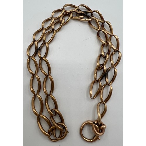 530 - A 9ct gold double chain bracelet. Length 20.5cm, weight 23.7gm.