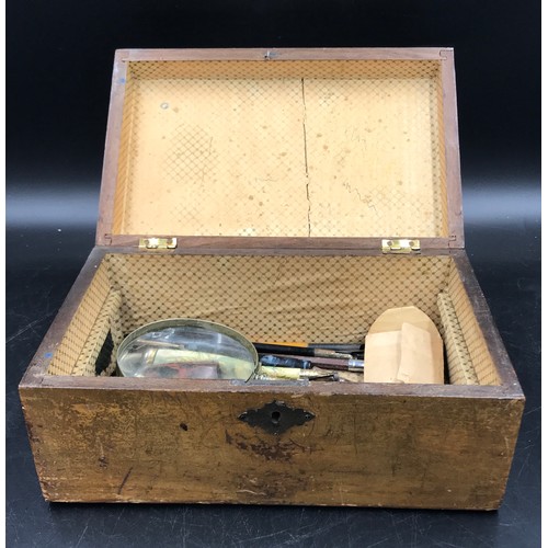 1001 - A 19thC inlaid box to include fountain pens, rulers and magnifying glass. Some fountain pens branded... 