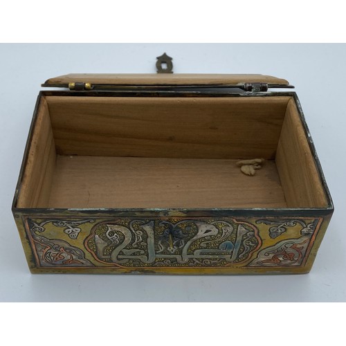 945 - A good quality Cairo Ware silver, copper and brass inlaid rectangular casket with script and foliate... 