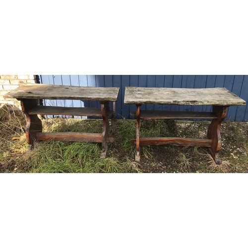 216 - A pair of Yew wood garden tables both approx. 107 l x 44 w x 66cm h.