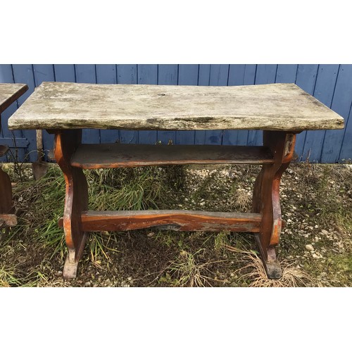 216 - A pair of Yew wood garden tables both approx. 107 l x 44 w x 66cm h.