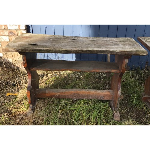 216 - A pair of Yew wood garden tables both approx. 107 l x 44 w x 66cm h.