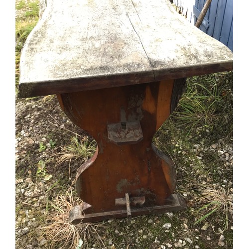 216 - A pair of Yew wood garden tables both approx. 107 l x 44 w x 66cm h.