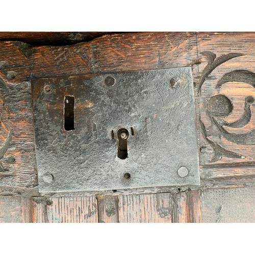59 - Late 17thC /early 18thC Oak two panelled kist with carved front frieze, candle compartment and origi... 