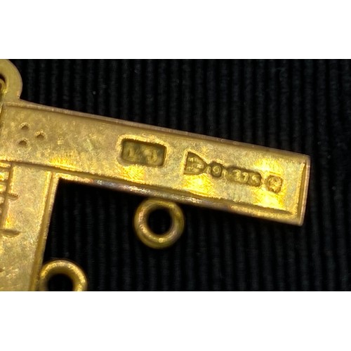 527 - A Freemasons in parts medal. Bar, chain, clip and square marked 9c, buckle and fastener unmarked. To... 