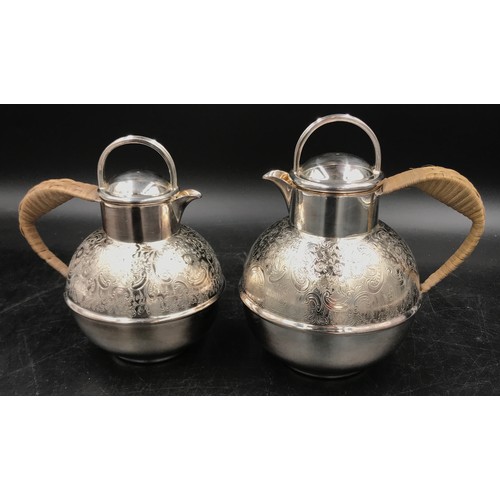 688 - Two silver plated coffee pots. One holding 1 pint the other holding 1 1/2 pint. Tallest standing at ... 