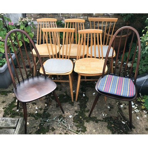 60 - A collection of 7 chairs, 2 sets of two and a set of three, one dark wood pair Ercol with blue label... 