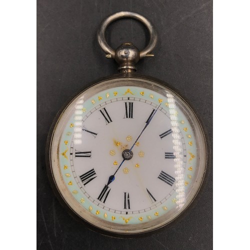 969 - A continental silver pocket watch marked .935 along with a white metal chain with three keys attache... 