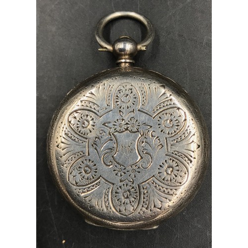 969 - A continental silver pocket watch marked .935 along with a white metal chain with three keys attache... 