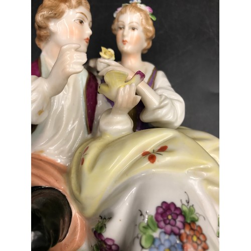 302 - A collection of four ceramic models to include three couples with markings on the base and one royal... 