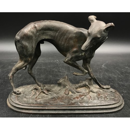 1054 - A selection of metal ware to include a bronze model of a greyhound in the manner of P.J. Mene 13cm h... 