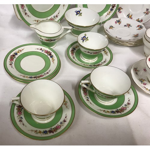 311 - A mixed lot of part tea sets to include a quantity of Coalport comprising of milk jug, 3 x cups and ... 