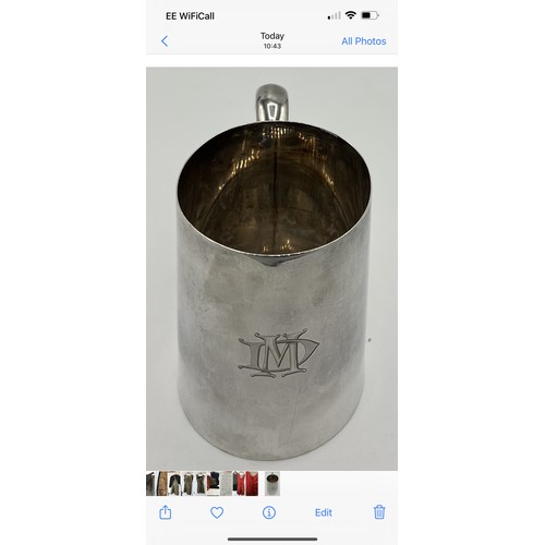 747 - A silver tankard Sheffield 1943, maker James Dixon & Sons Ltd. 342g. 13cm h. Initialled to the front... 