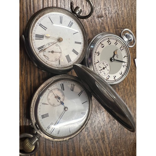 978 - Three various pocket watches to include hallmarked silver .935 white metal and Smith's Empire.