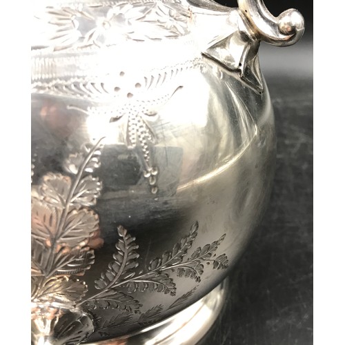 1051 - Two Victorian copper kettles and a silver plated spirit kettle. Copper kettles measuring at 29 h 28c... 