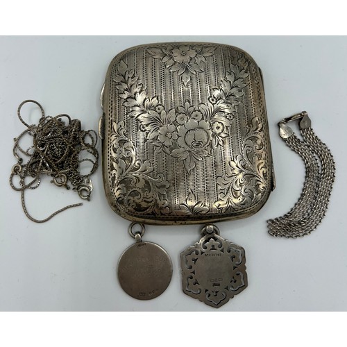 716 - Silver to include cigarette case Birmingham 1908, chains, bracelet and 2 medals including Beverley. ... 