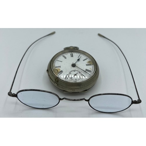 979 - A silver plated pocket watch together with early 20thC spectacles.