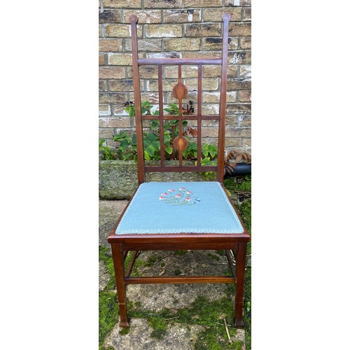 81 - A reupholstered mahogany inlaid side chair in the Arts and Crafts style. Height to back 94 h height ... 