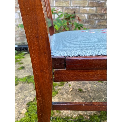 81 - A reupholstered mahogany inlaid side chair in the Arts and Crafts style. Height to back 94 h height ... 