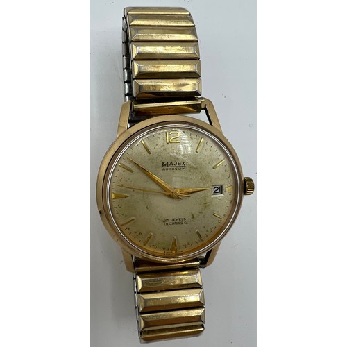 974 - A vintage 9 carat gold Majex Autoslim wristwatch on expanding gold plated bracelet.