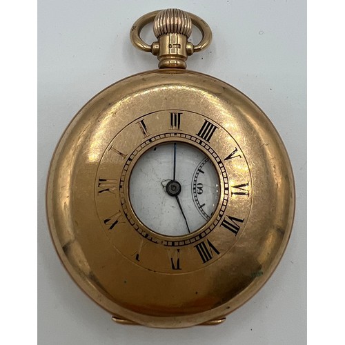 976 - Nine carat gold half hunter pocket watch. 5cm diameter. Total weight 99gm.