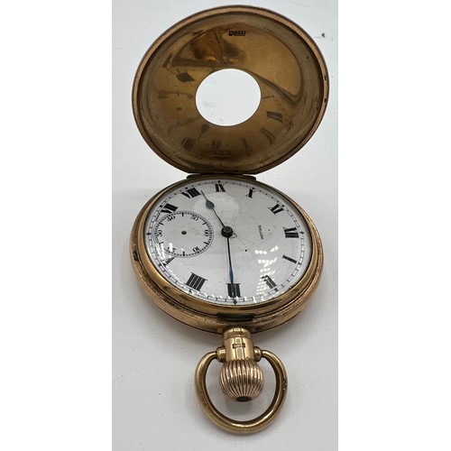 976 - Nine carat gold half hunter pocket watch. 5cm diameter. Total weight 99gm.